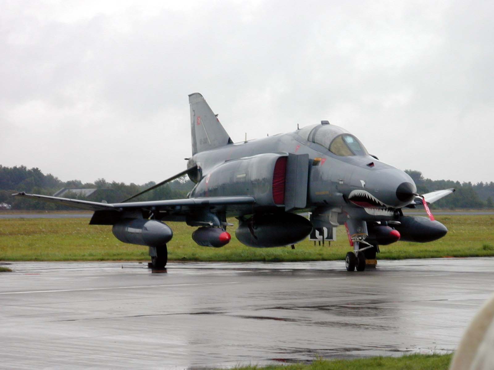 wet a-4 phantom het fighter plan attack aircraft on runway