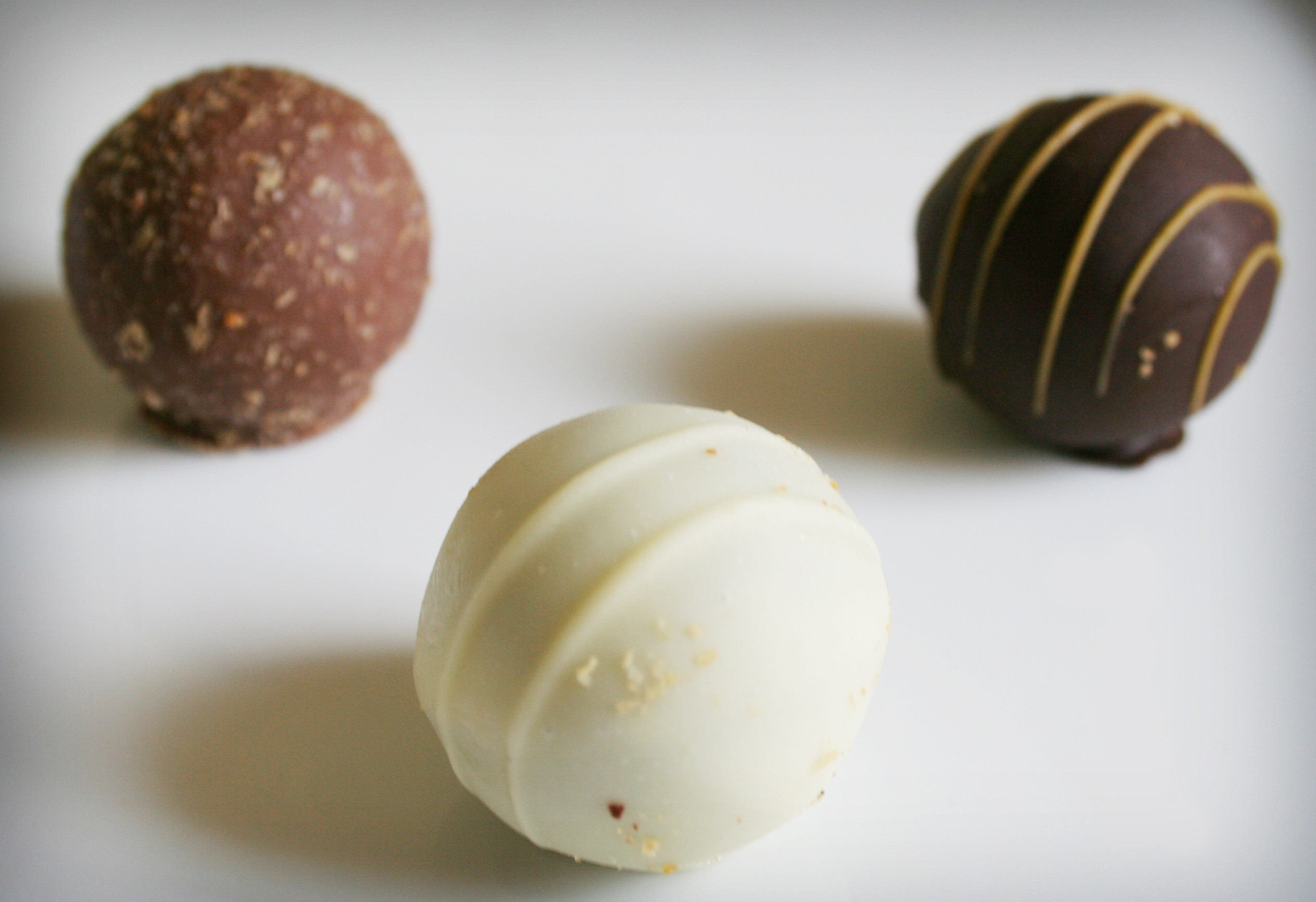 How do you coat perfectly round truffles with melted chocolate ...